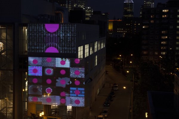 Period projects an interactive grid on the side of a building and users can affect one of the squares with their phones. Photo: Courtesy of the artist.